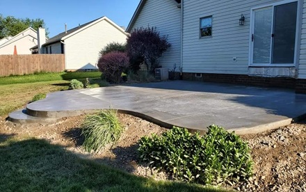 Back Patio photo of a freshly finished concrete patio