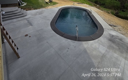 photo of a formed pool patio with steps